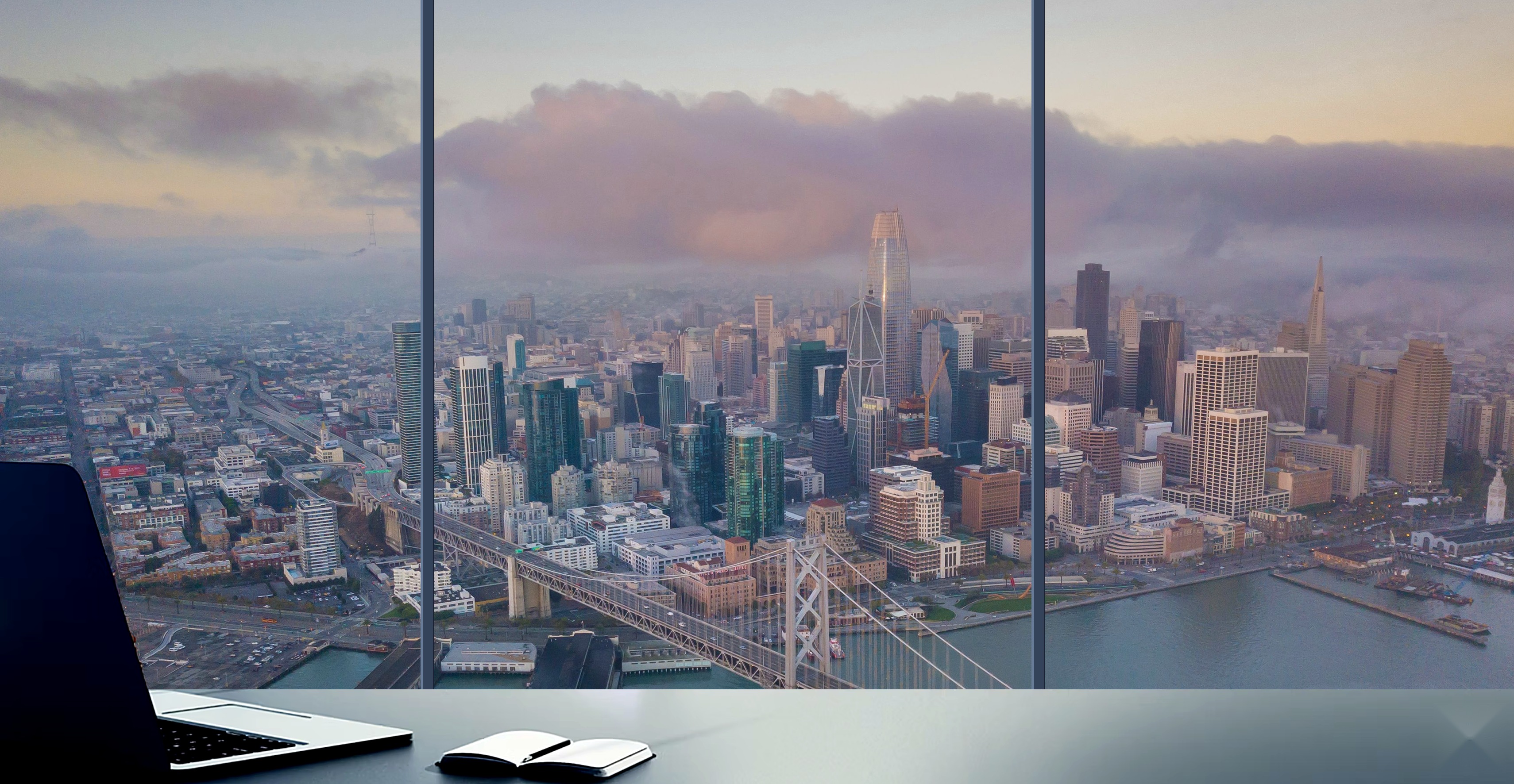 San Francisco Bay Area skyline through a glass curtain wall